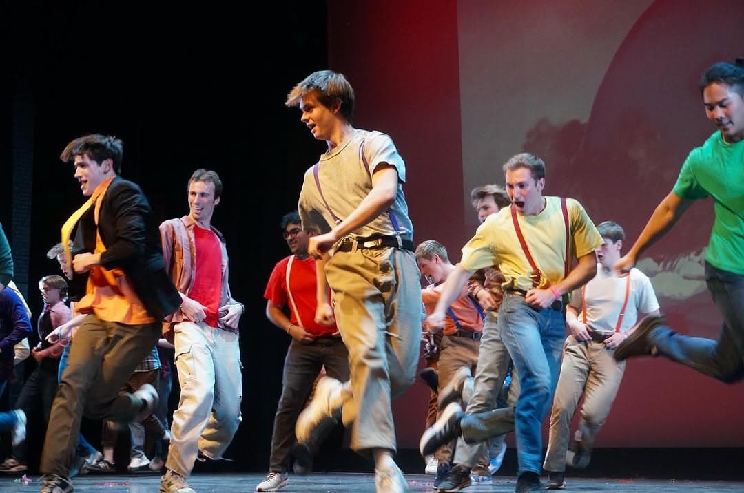 Brothers dancing at a philanthropy event